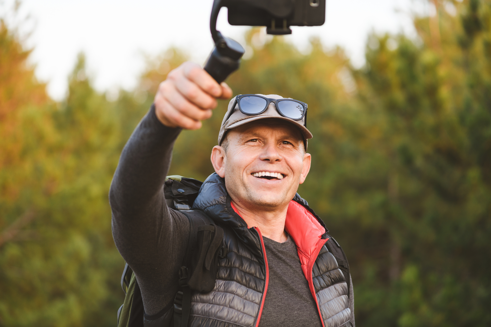 Man taking selfie while hiking